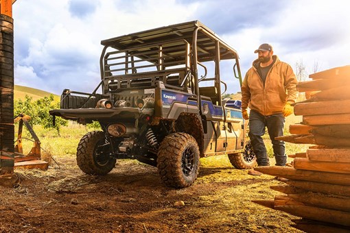 Three-quarter rear angle of a parked side x side off-road. opens in a new window