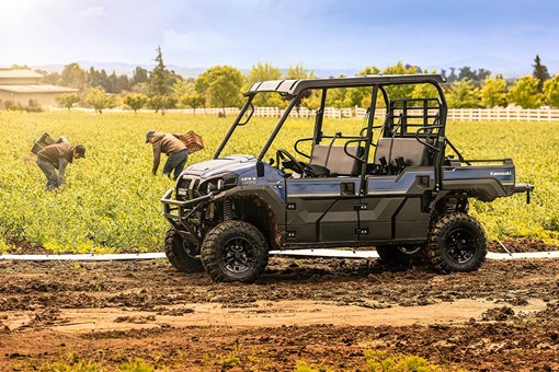 Side angle of a parked side x side in a field. opens in a new window