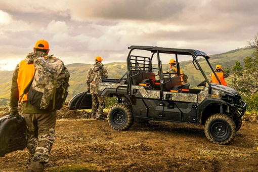 Three-quarter front angle of a side x side parked off-road. opens in a new window