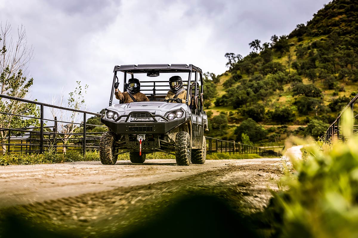 Front angle of a person driving a side x side off-road.