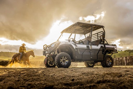 Side angle of a side x side parked in a paddock. opens in a new window