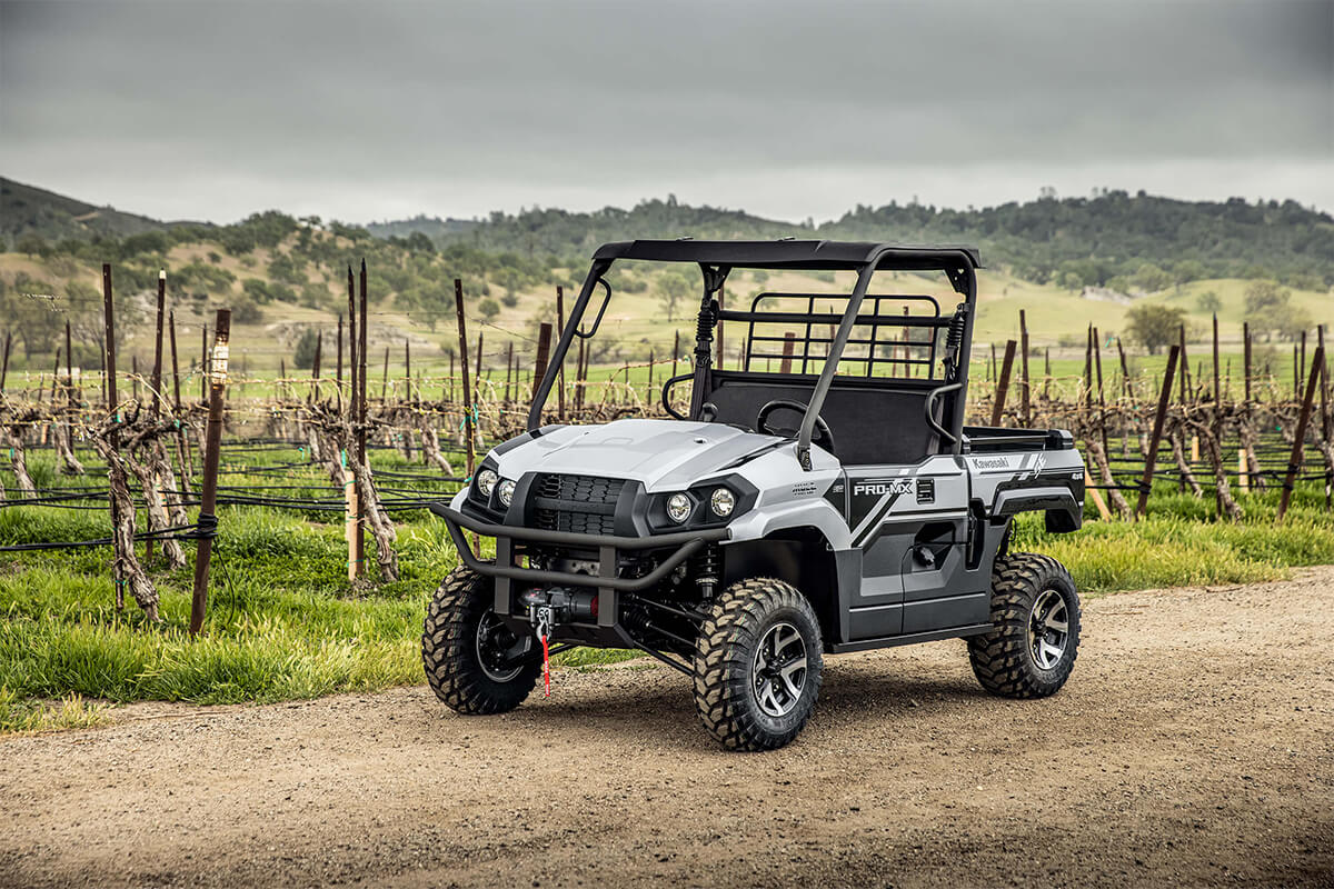 Three-quarter front angle of a side x side parked off-road.