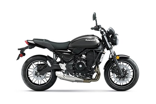 Profile angle of a motorcycle staged in a white studio background. opens in a new window