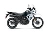 Profile angle of a motorcycle staged in a white studio background.