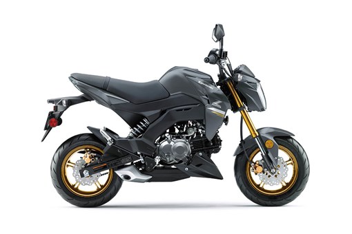 Profile angle of a motorcycle staged in a white studio background. opens in a new window
