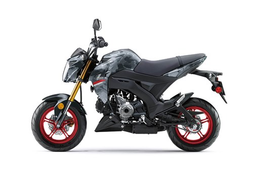 Profile angle of a gray motorcycle staged in a white studio background. opens in a new window
