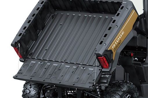 Three-quarter rear angle of a side x side's cargo bed fully lifted. opens in a new window