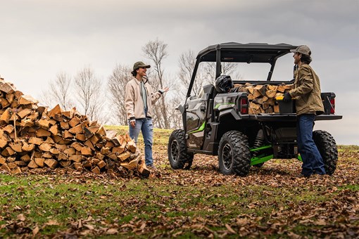 Three-quarter rear angle of a parked side x side being loaded. opens in a new window