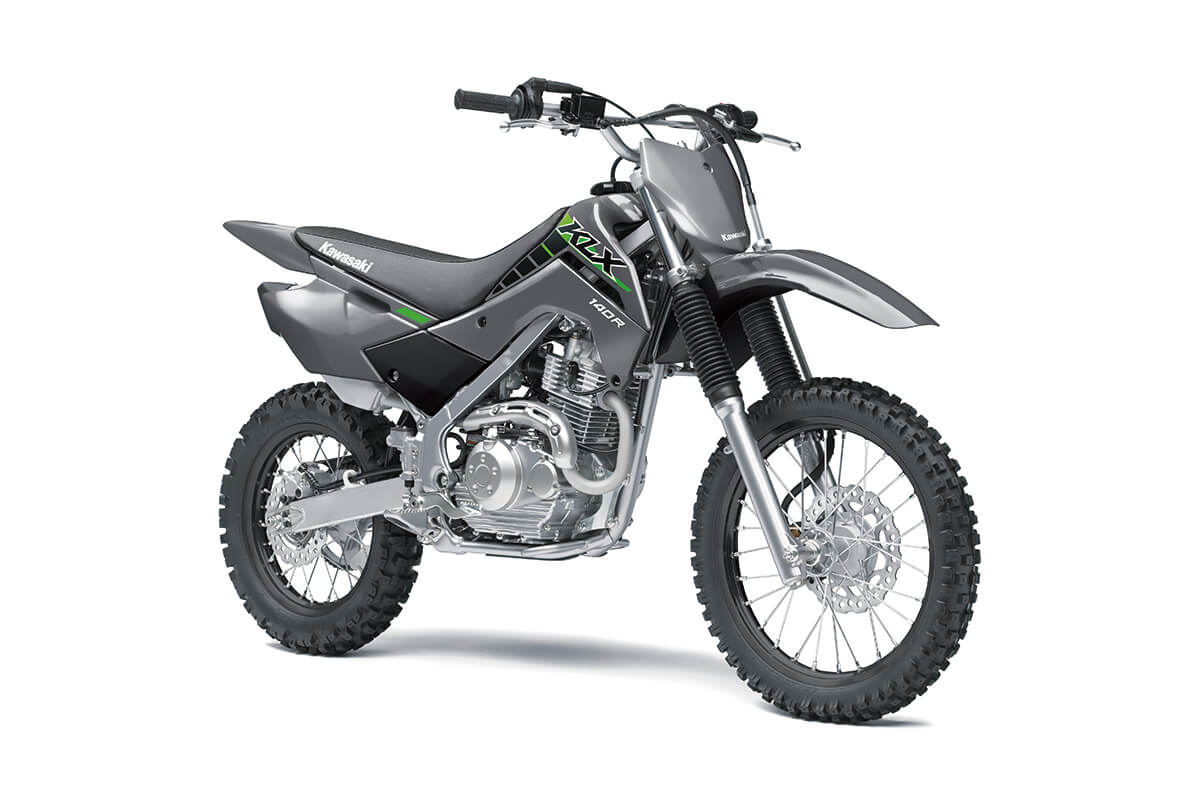 Three-quarter front angle of a gray motorcycle staged in a white studio background.