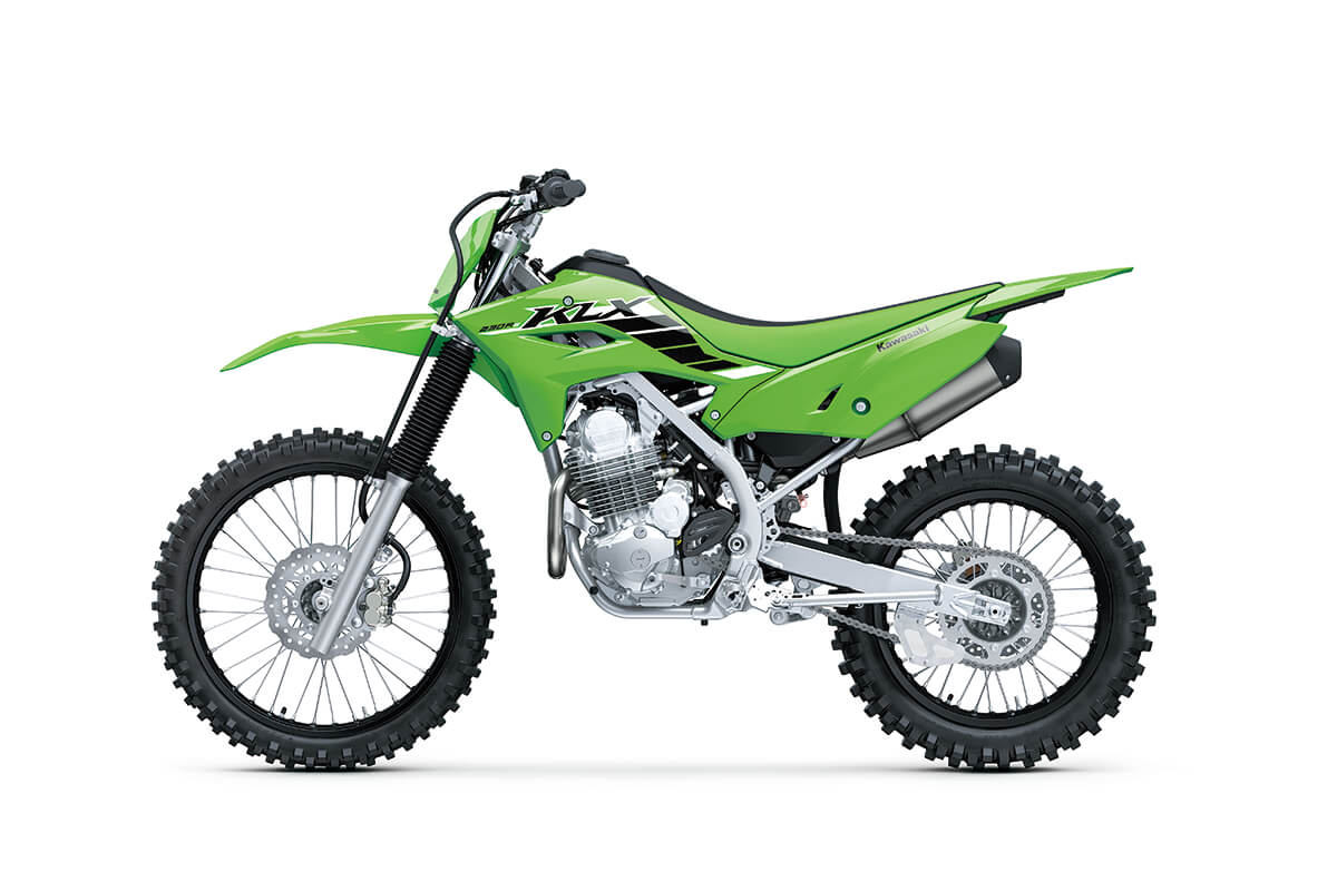 Profile angle of a green motorcycle staged in a white studio background.