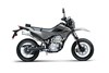 Profile angle of a gray motorcycle staged in a white studio background.