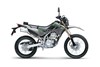 Profile angle of a gray motorcycle staged in a white studio background.