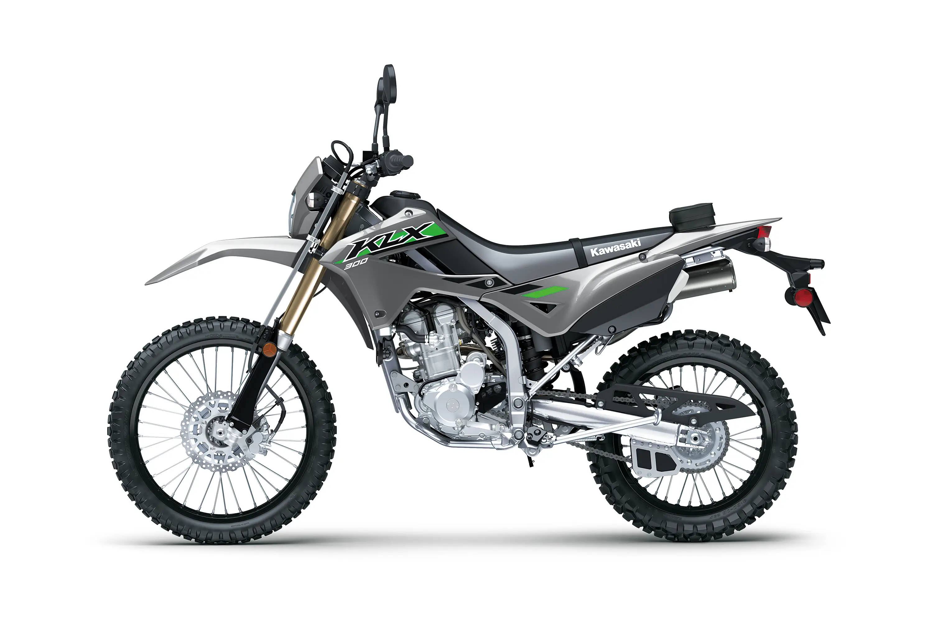 Side angle of a gray motorcycle staged in a white studio background.
