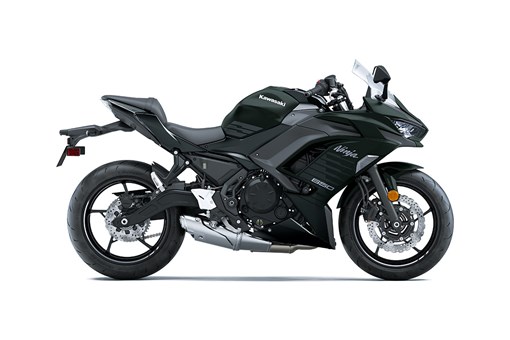 Profile angle of a black motorcycle staged in a white studio background. opens in a new window