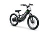 Three-quarter front angle of a black electric balance bike staged in a white studio background.