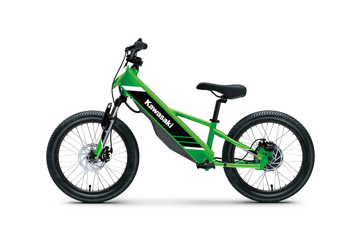 Profile angle of a lime green electric balance bike staged in a white studio background.