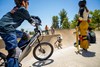 Close up angle of a young adult riding an electric balance bike.