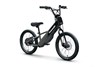 Three-quarter front angle of a black electric balance bike staged in a white studio background.