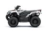 Profile angle of a white ATV staged in a white studio background.
