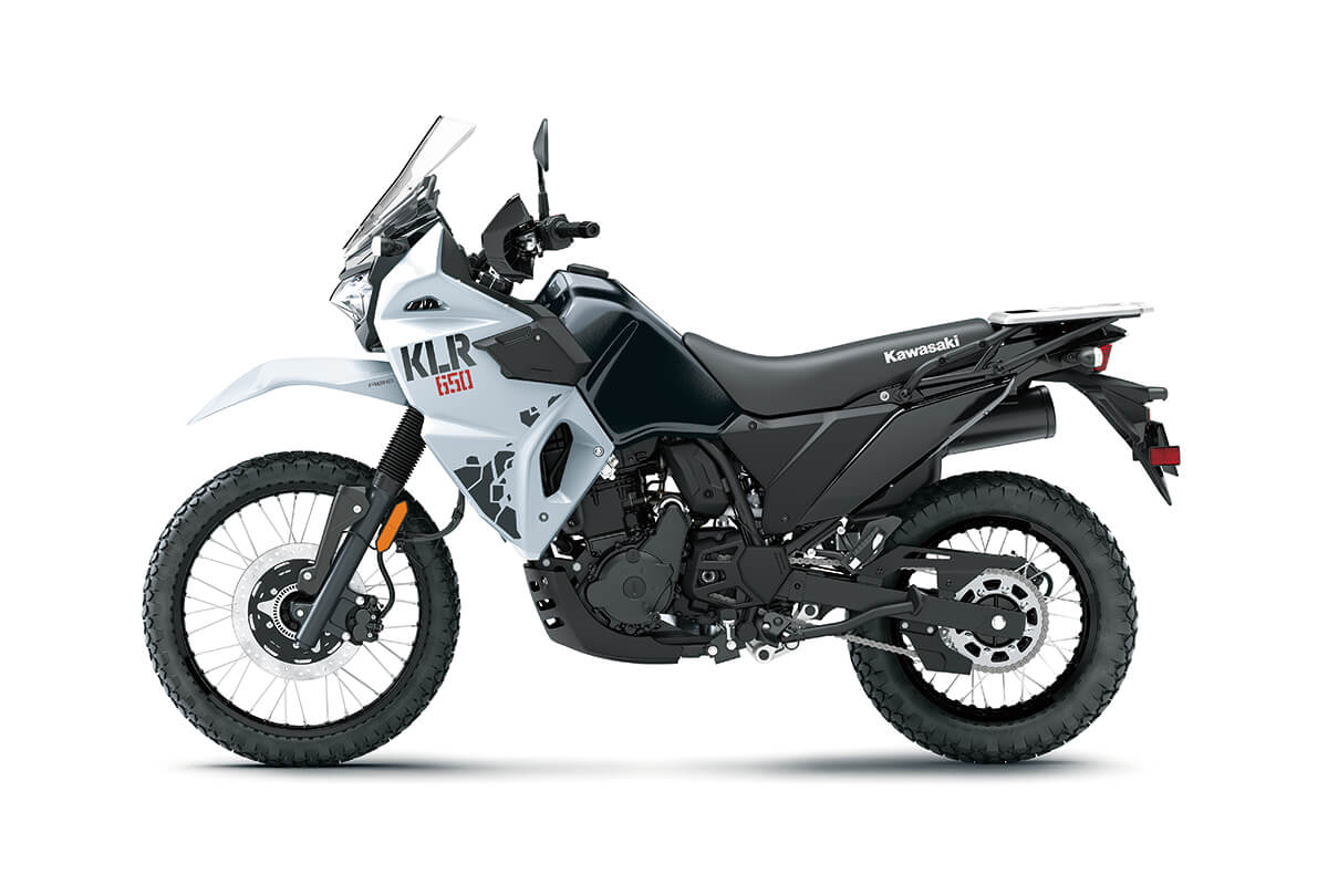  Profile angle of a white motorcycle staged in a white studio background.