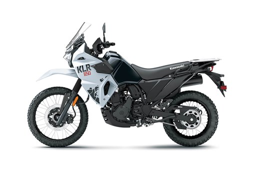  Profile angle of a white motorcycle staged in a white studio background. opens in a new window