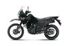  Profile angle of a black motorcycle staged in a white studio background.