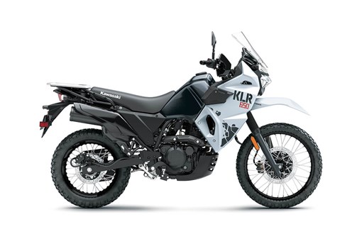 Side angle of a white motorcycle staged in a white studio background. opens in a new window