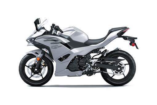 Profile angle of a motorcycle staged in a white studio background. opens in a new window