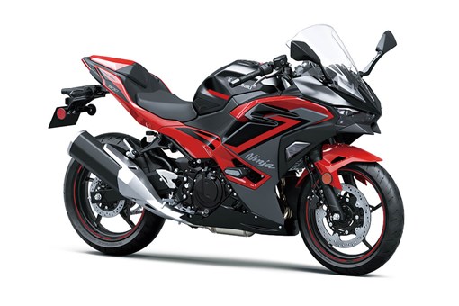 Three-quarter front angle of a red motorcycle staged in a white studio background. opens in a new window