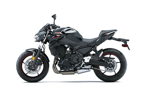 Profile angle of a motorcycle staged in a white studio background. opens in a new window