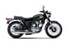 Profile angle of a motorcycle in a white studio background.