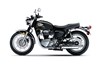 Side angle of a motorcycle in a white studio background.