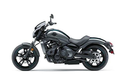 Profile angle of a motorcycle staged in a white studio background. opens in a new window