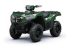 Front three-quarter view of a green ATV staged in a white studio background.