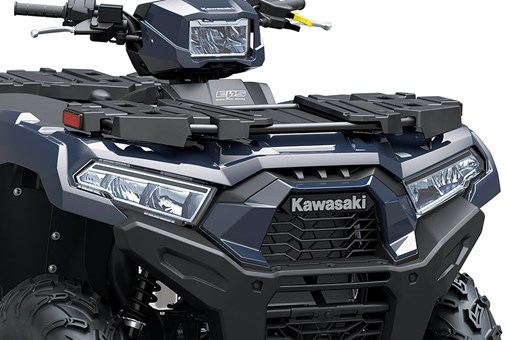 Close-up view of the front end and headlights of an ATV. opens in a new window