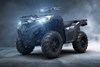 Front three-quarter view of an ATV staged in a dark steamy studio background.