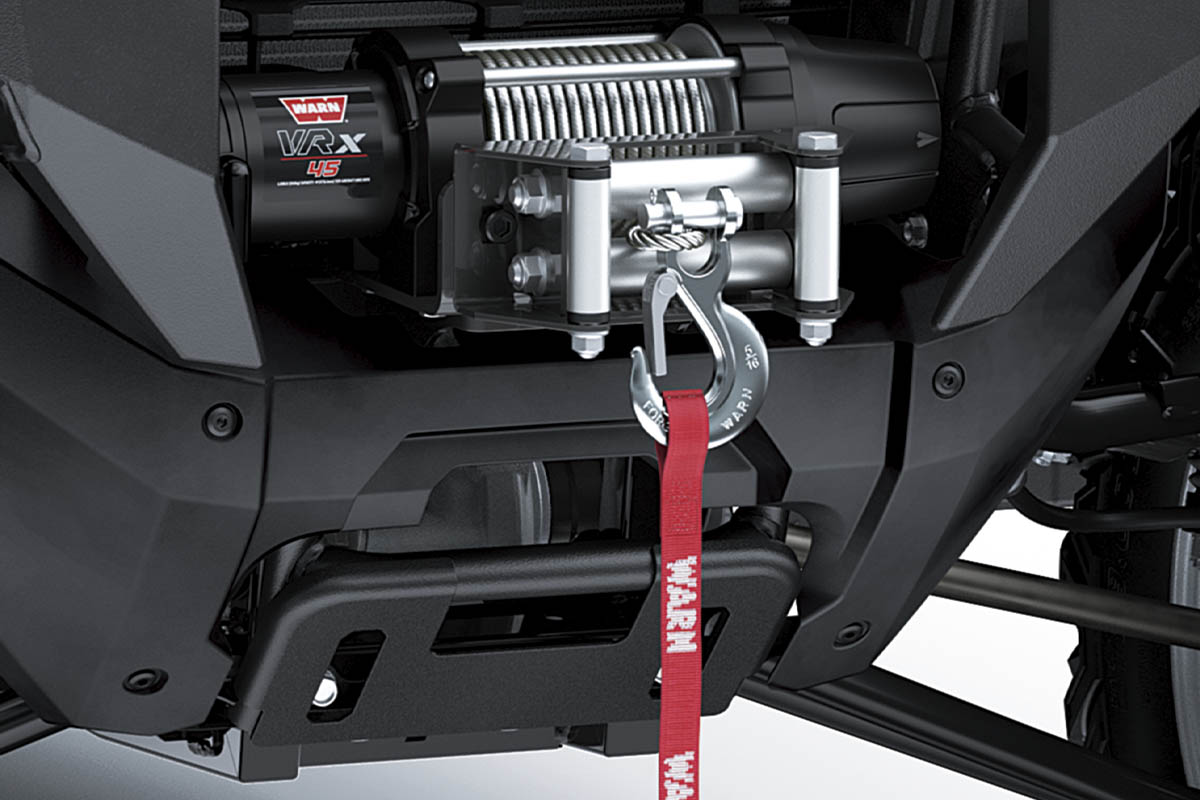 Closeup view of the winch on a side x side staged in a white studio background.