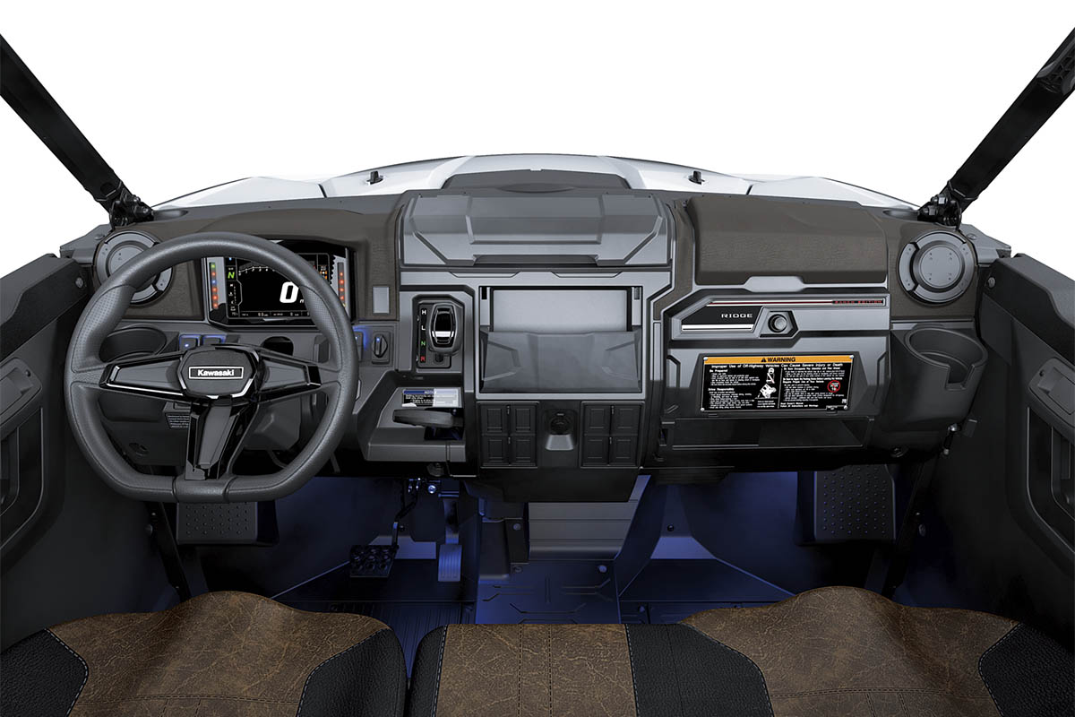 Front angle of the dashboard of a side x side staged in a white studio background.