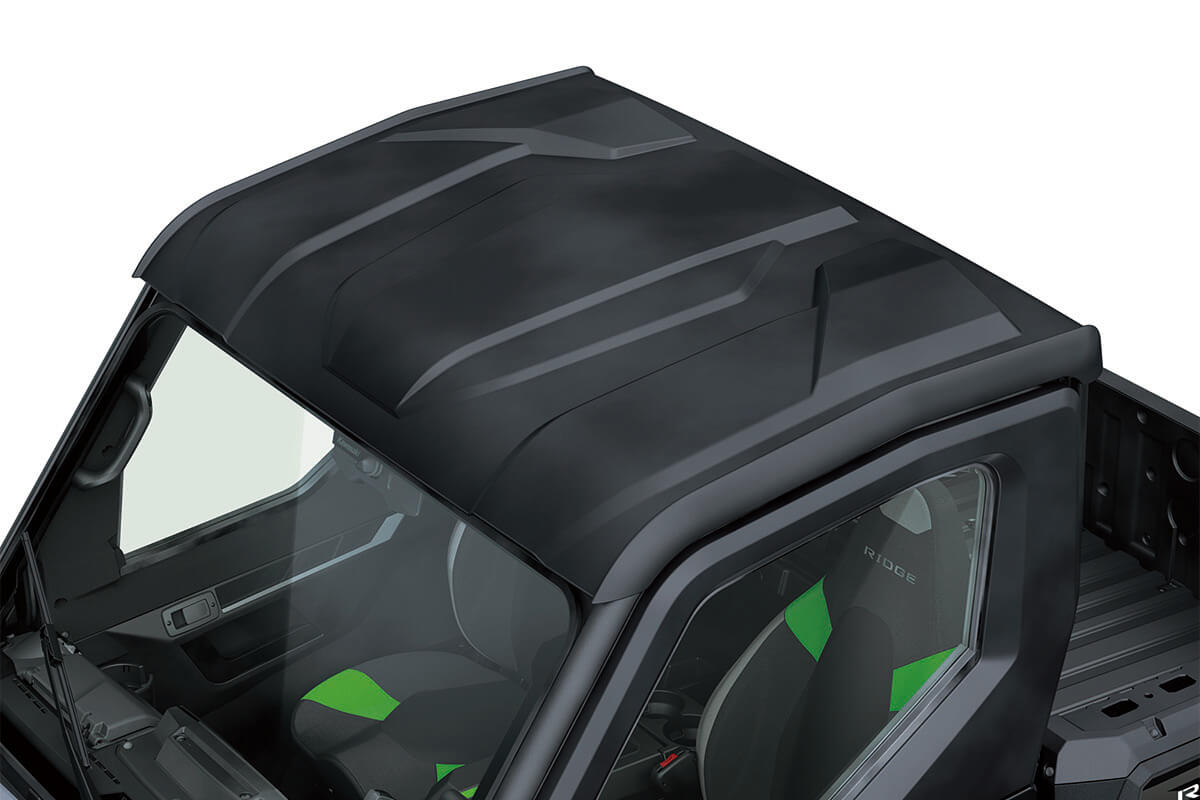 Top-down view of the roof of a side x side staged in a white studio background.