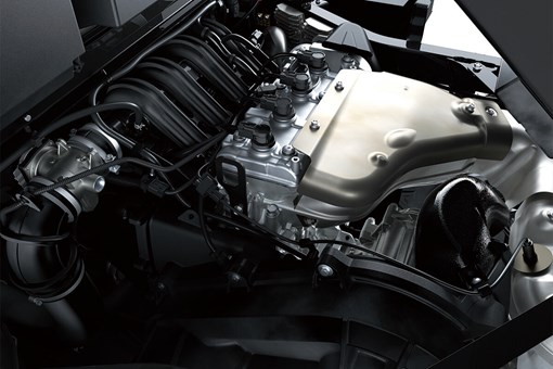 Top-down view of a side x side engine from inside the engine compartment. opens in a new window