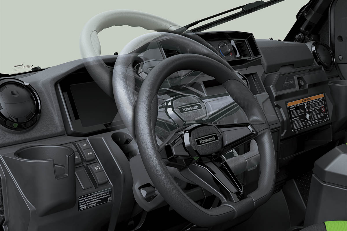 Interior angle view showing adjustability of the steering wheel of a side x side.