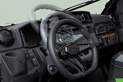 Interior angle view showing adjustability of the steering wheel of a side x side. opens in a new window
