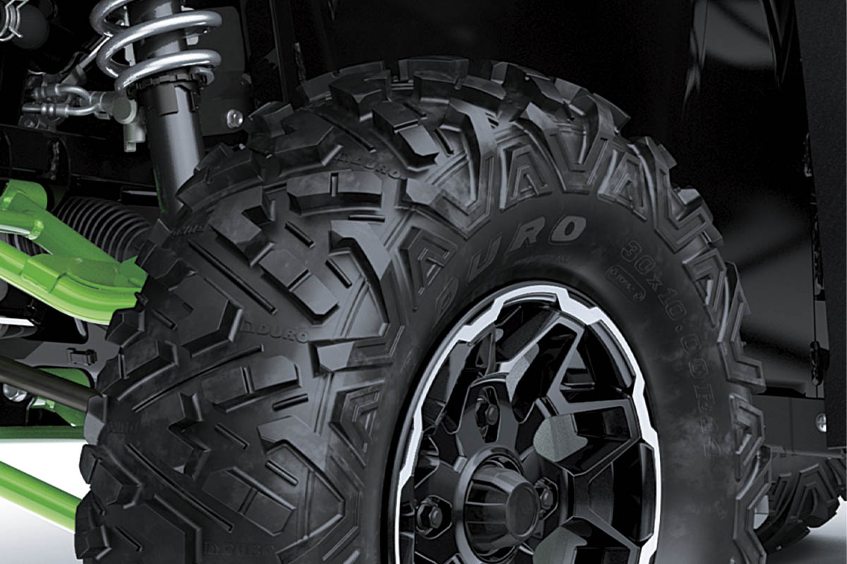 Close-up view of the tire of a side x side.