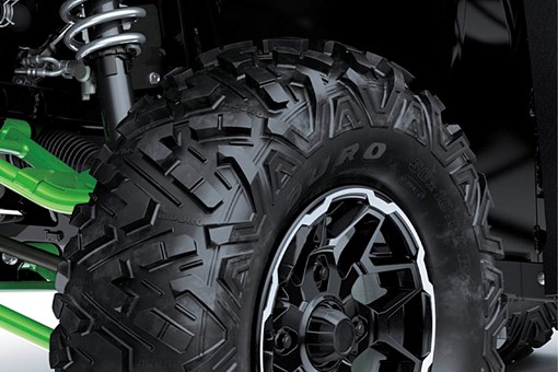 Close-up view of the tire of a side x side. opens in a new window