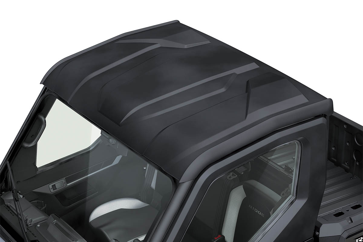 Top-down view of the roof of a side x side staged in a white studio background.