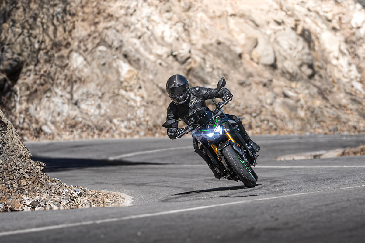 Front angle of a motorcycle in the mountains.