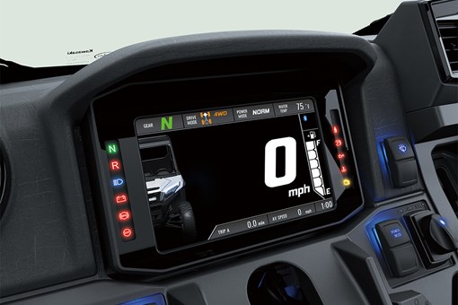 Closeup view of the full-color instrument panel of a side x side. opens in a new window