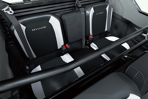 Interior view of rear bench seating inside a side x side. opens in a new window