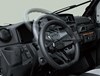 Interior angle view showing adjustability of the steering wheel of a side x side.