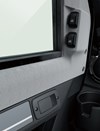 Interior door handle, cup holder and power window control switch of a side x side.